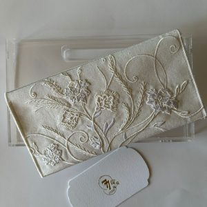 Off-white fabric envelope embroidered with off-white roses