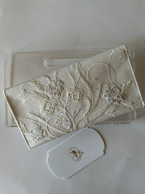 Off-white fabric envelope embroidered with off-white roses